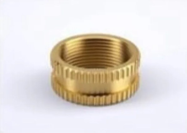 Large-bore knurled insert for thick-wall bosses