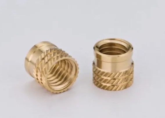 Knurled inserts in natural brass finish