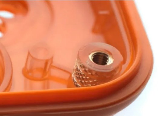 Heat-set insert installed in a moulded housing