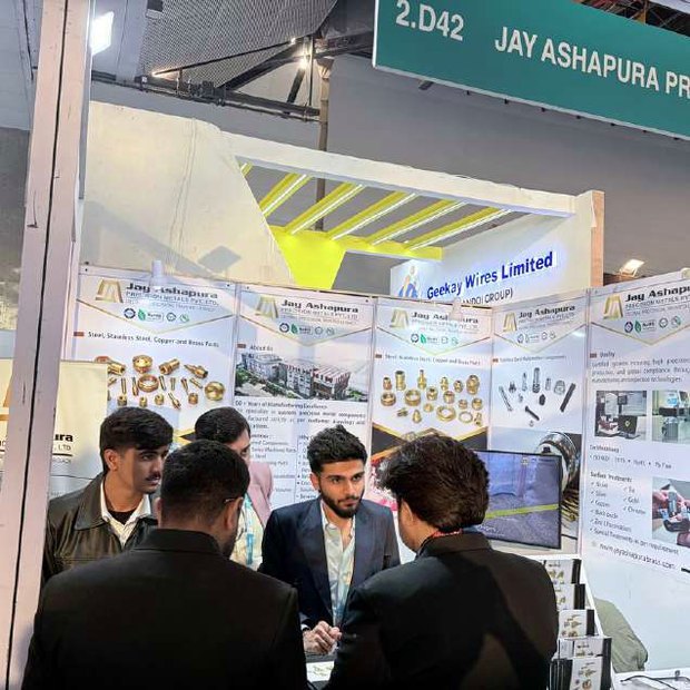 Technical discussion with OEM customers at a component exhibition